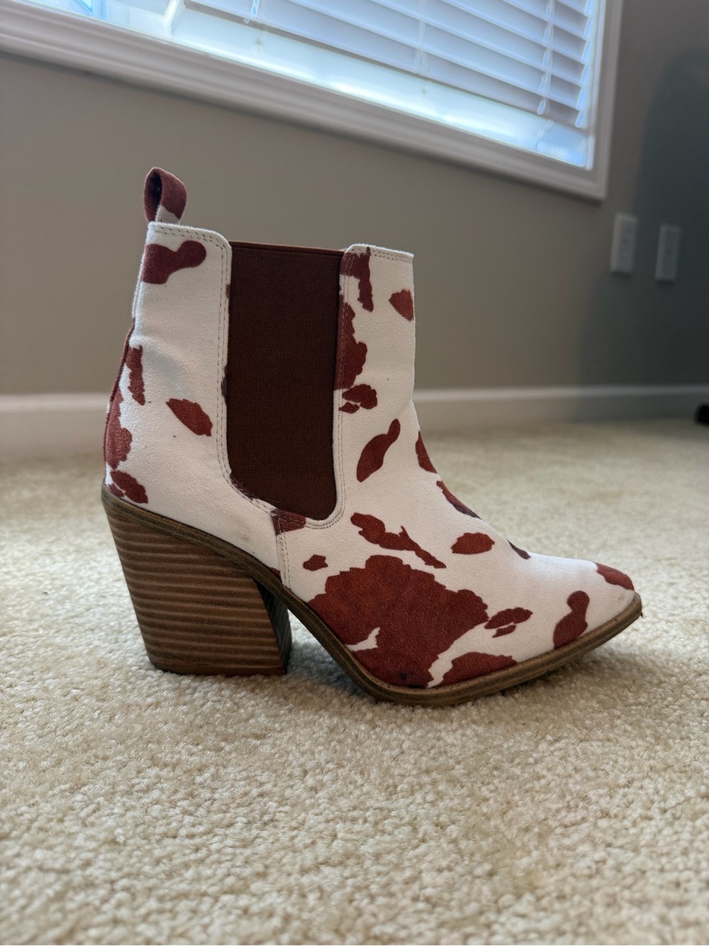 Women’s Cow-Print Ankle Bootie in White and Rust